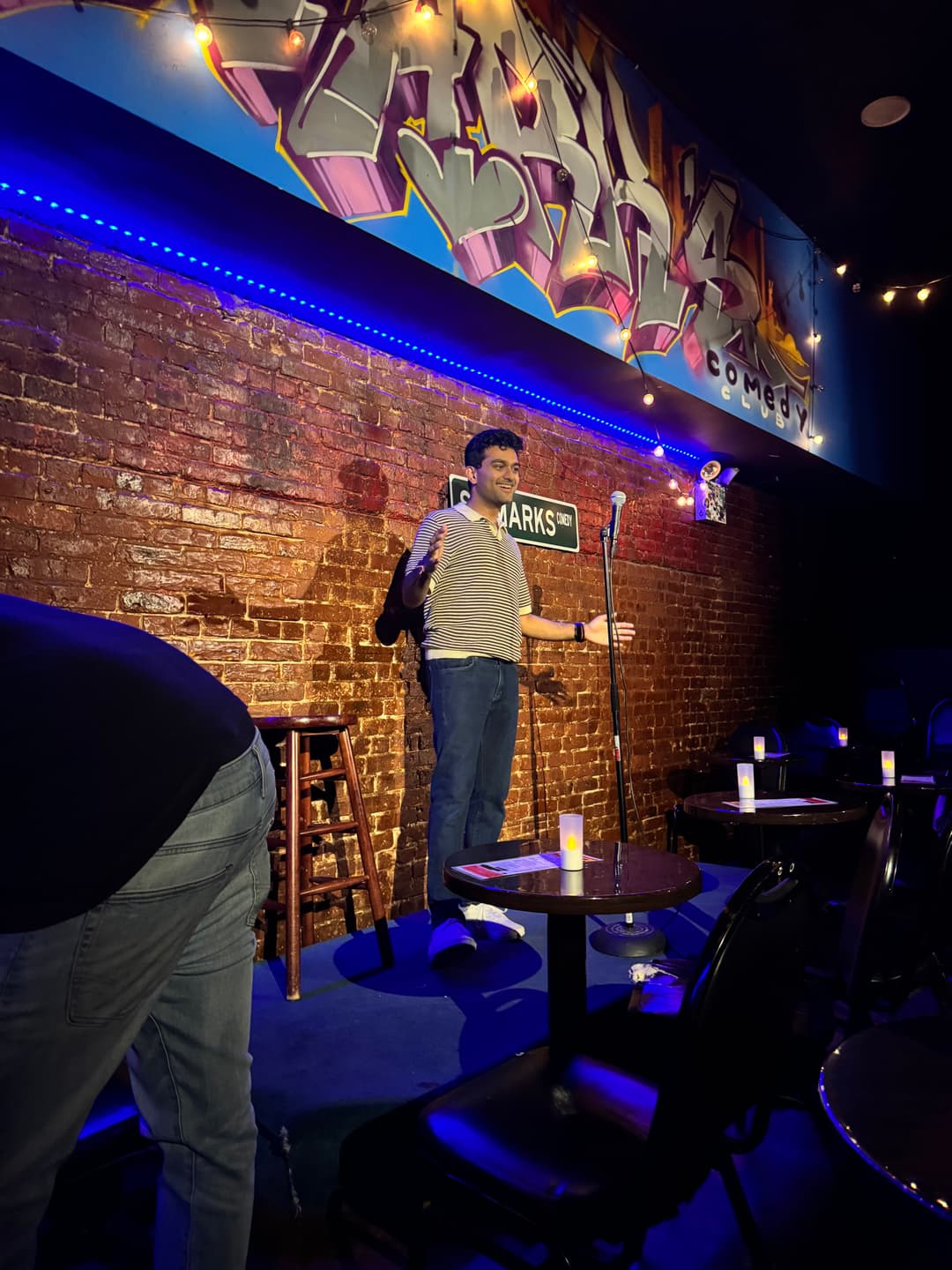 Shrey Ravi performing standup comedy